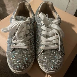 Betsey Johnson silver sneakers. Kids size 4. Fits a women’s size 6.
